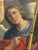 Large arched oil painting on canvas depicts the baptism of Jesus by John the Baptist in a landscape setting. This piece is...