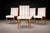 A sculptural and highly disciplined dining set by Giuseppe Scapinelli, this rare group of eight chairs embodies the...