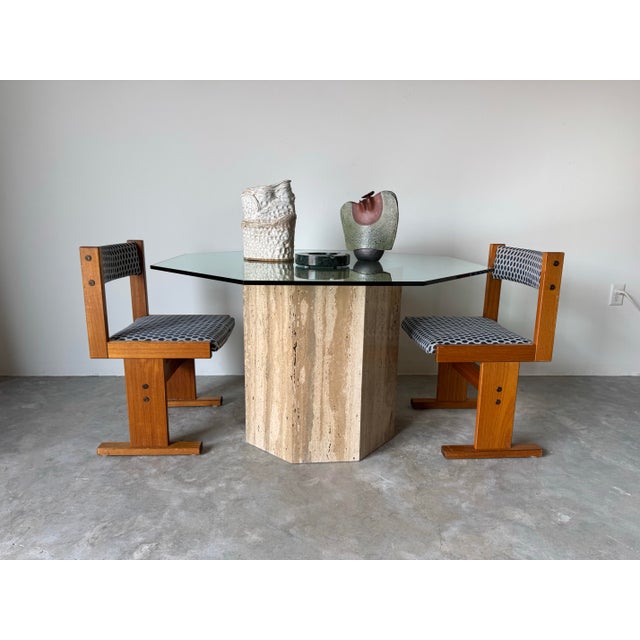A striking example of Italian postmodern design, this octagonal pedestal dining table showcases a bold sculptural base...