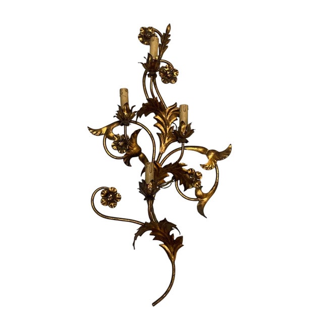 Large pair of large vintage Florentine wall sconces, showcasing classic mid-century Italian craftsmanship. Made from...