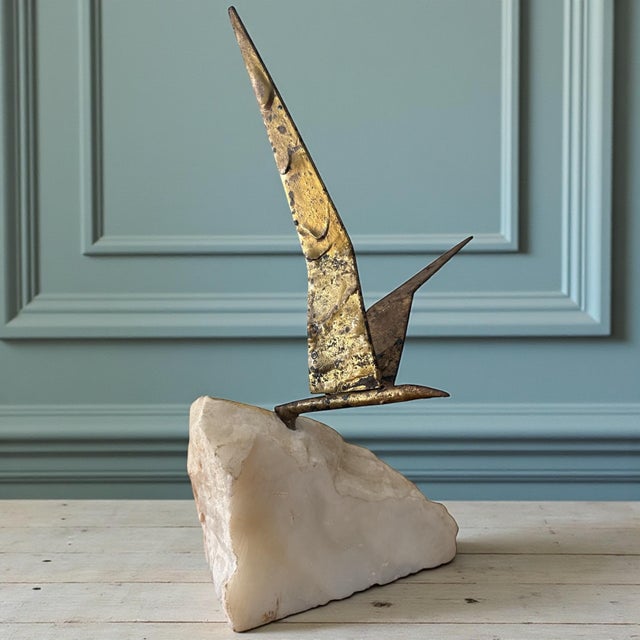 This 1971 Curtis Jere abstract bird sculpture exemplifies the sculptural metalwork that defined the brand’s most...