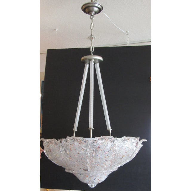 This rare large vintage Italian Murano glass multi-colored murine leaf chandelier is a stunning piece of lighting for any...