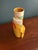 Hand-painted Clarice Cliff vase produced by Newport Pottery, England. A striking stepped geometric form decorated in the...
