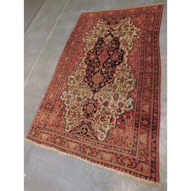 Origin: Persian Material: Wool pile on cotton foundation Weaving technique: Finely Hand knotted Size: 4'x 6'8" Circa: 1920