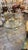 This listing features an Italian Art Deco coffee table with beveled edges, metal finishings, and a mirror base. Art Deco-...