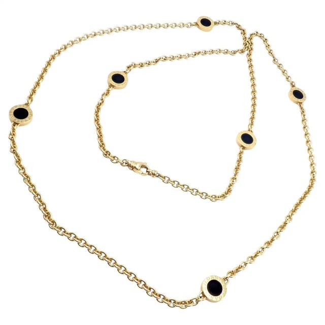 18k Yellow Gold Black Onyx 29.5" Link Long Signature Necklace by Bulgari. Details: Metal: 18k Yellow Gold Weight: 38.1...