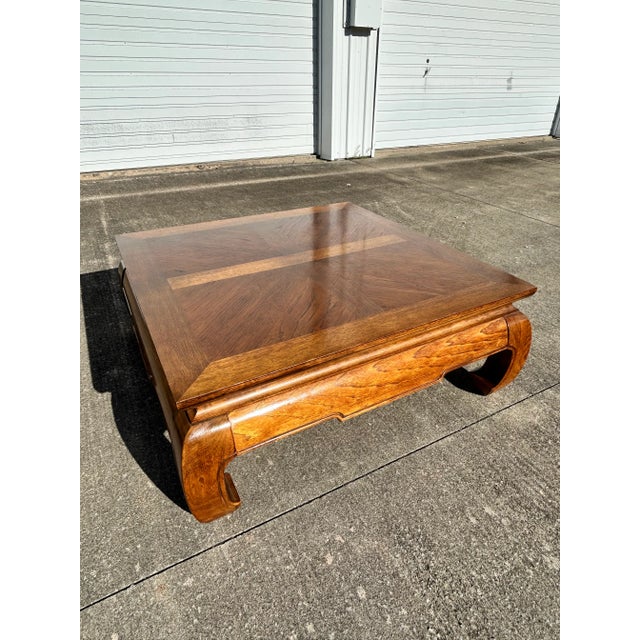 Vintage 1980s Ming Style Coffee or Cocktail Table. Crafted from solid wood construction with gorgeous natural grain and...