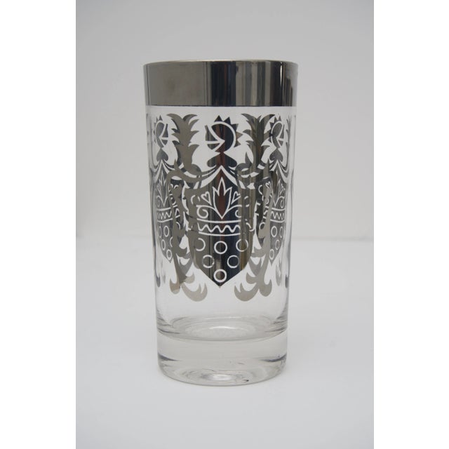Mid Century Hollywood Regency Kimiko barware set consisting of four glasses and a set of coasters. There are four coasters...