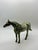 Elegant vintage cast metal horse sculpture featuring a graceful standing pose and a beautifully aged silver-toned finish....