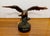 This vintage eagle sculpture from the 1970s is regal. It is copper plated and the bird is in attack mode with claws open,...
