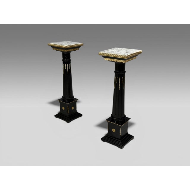 Maison Jansen Style, Hollywood Regency, Marble Top Pedestals, Ebonized Wood, Bronze, France, 1960s Pair of bronze-mounted...