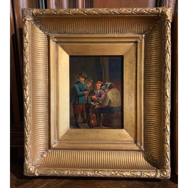 Evoking the lively tavern interiors of the Dutch and Flemish Old Masters, this engaging pair of antique genre paintings...