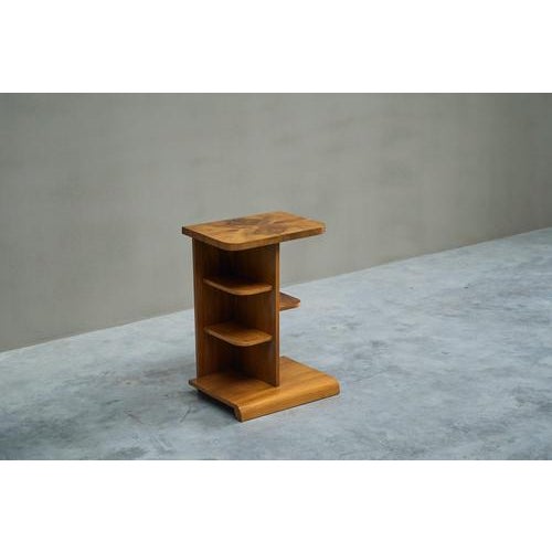 A wonderful and very versatile art deco side cabinet / side table with shelving in walnut veneer. Europe, 1930s. An...