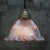 Clear glass lampshade by Holophane, France. Brass glass holder with porcelain bulb holder. 2 meter black wire. This piece...
