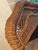 Vintage natural rattan and wicker arched wall or floor mirror showcases an intricate woven braid design with an open...