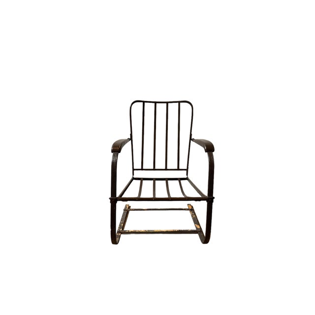 Great bouncy patio/outdoor chair frame "as-found" ... chippy brown paint over orange inspiring new cushions in M&K...