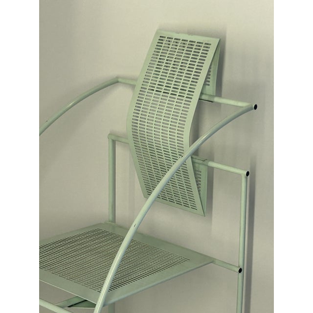 Quinta chair with enameled metal frame and perforated and folded sheet metal seat and back. 1985. I have official proof of...