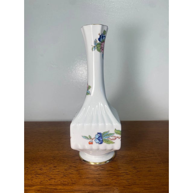 Beautiful vintage Aynsley Pembroke bud vase featuring a delicate floral and bird design. Made of fine bone china, this 7...