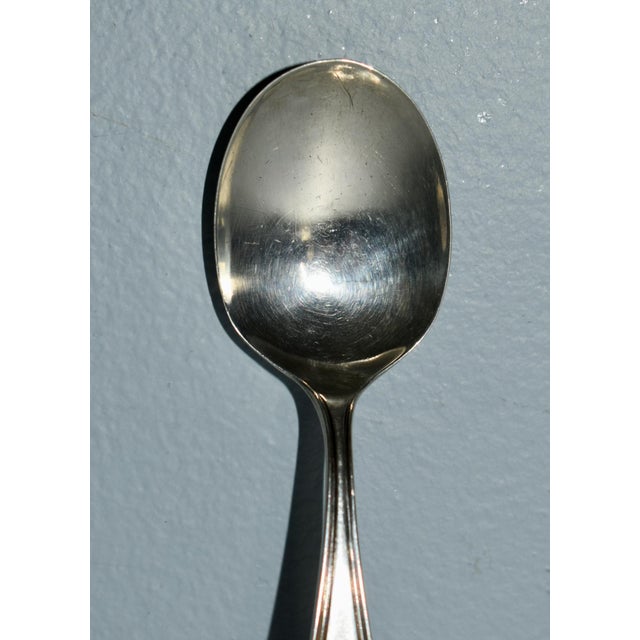 Vintage (1960's) Child's Spoon has a Traditional Style. Made of Sterling Silver. The Measurements: 4" x 1.25" x .50". Flat...