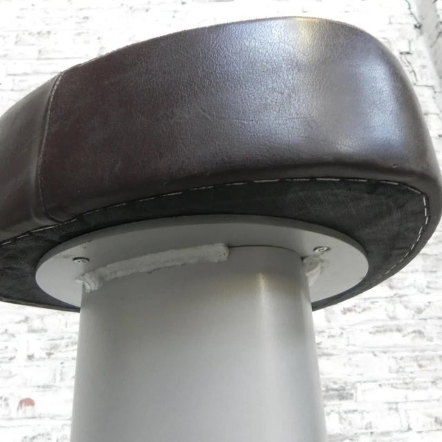 2 sturdy bar stools, 1 of which has one scratch in the seat. The scratch is not completely through the skai. Height: 81...