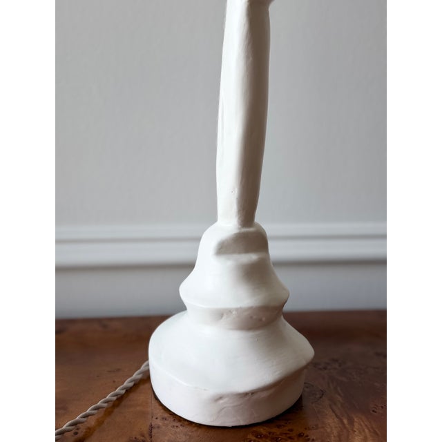 A striking 20th-century sculptural table lamp inspired by the celebrated designs of Diego Giacometti, this distinctive...
