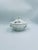 This antique Art Nouveau soup tureen is crafted from high-quality white porcelain. It features a matching lid with a...