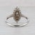 Metal 0.20ctw Diamond 3-Stone Marquise Halo Ring 14k White Gold Size 6.25 For Sale - Image 7 of 8