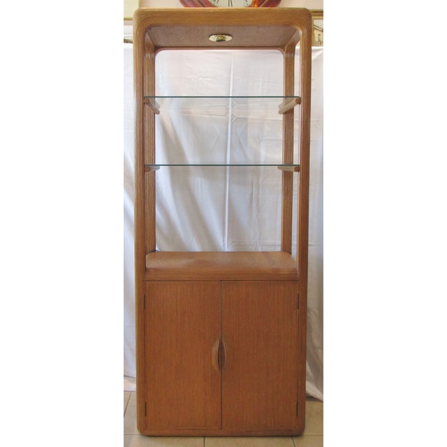 Matched Pair of Pencil Reed Etageres in the Style of Gabriella Crespi This pair of matching wall units each has two glass...