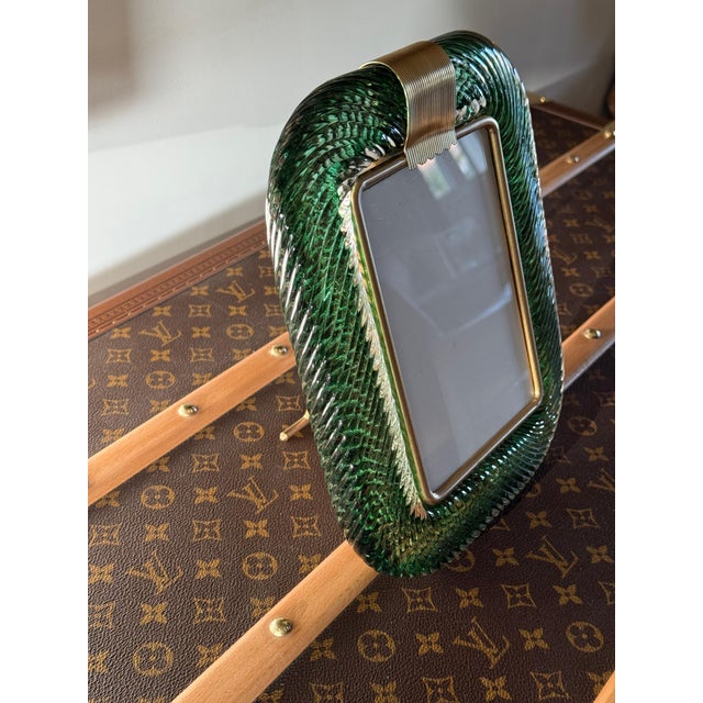 This magnificent vertical photo frame is purely in the tradition of Venetian glassmaking. The technique used to achieve...