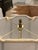 This is a vintage Hollywood Regency style acanthus leaves table lamp, often attributed to manufacturers like Frederick...