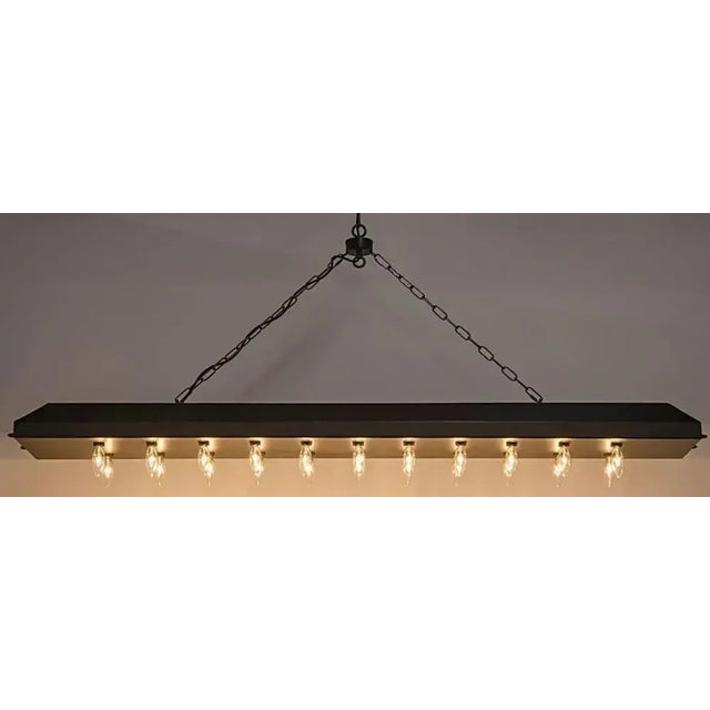 Ideal for large dining areas or open living spaces, the 545 Club Pendant casts a warm and atmospheric glow, creating an...