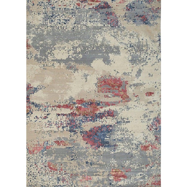 This gray wool and viscose rug features a hand knotted pile construction consistent with the style of EORC Rugs. It serves...