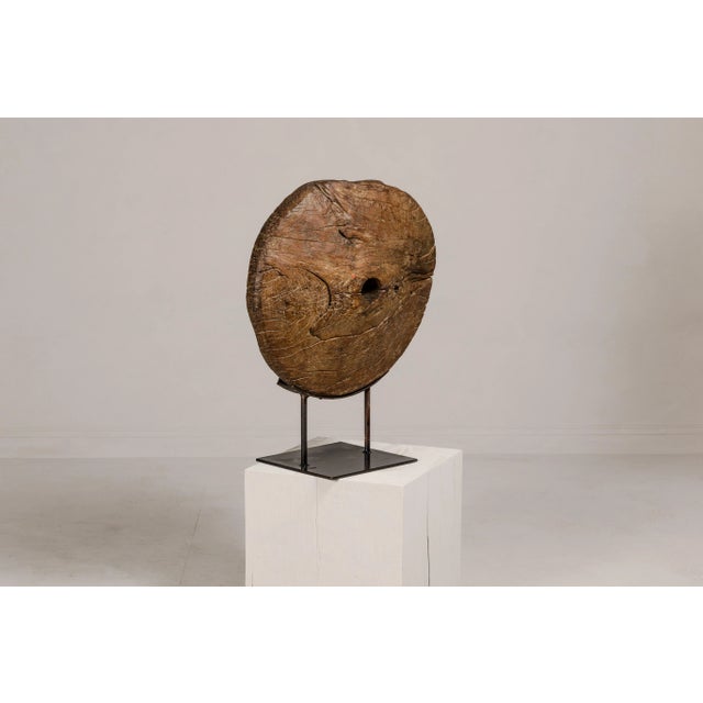Ancient Rustic Cart Wheel Mounted on Black Lacquer Base, Weathered Patina For Sale - Image 11 of 12