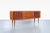Beautiful Danish modern teak tambour door credenza designed in Denmark, circa 1960s. This piece features a well-crafted...