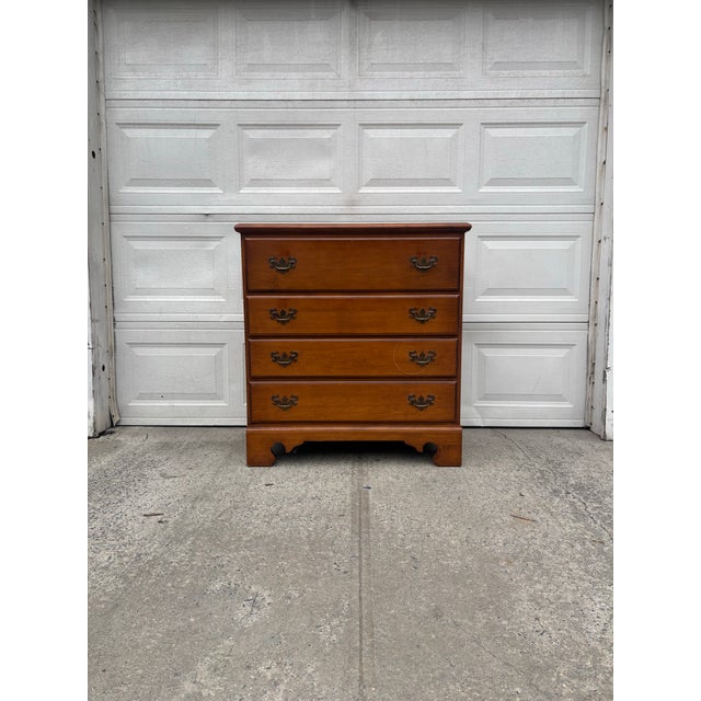 We have a beautiful vintage Colonial Revival maple secretary desk chest for sale. This slant front secretary bureau...