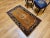 This beautiful vintage Chinese Art Deco area rug from the early 20th century showcases the warm elegance of a caramel-...