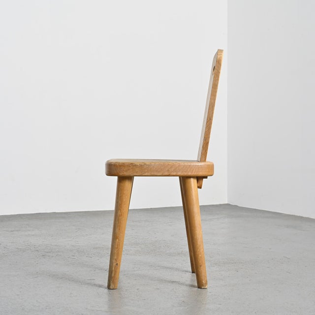 Chair designed by Christian Durupt, a renowned French cabinetmaker who collaborated with Charlotte Perriand. Made of solid...