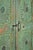 This Antique Indian Painted Teakwood Small Armoire is handcrafted from solid teakwood, featuring four carved sunburst door...