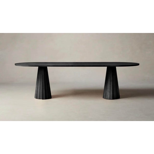 Like-new 114” dining table. Table is in excellent condition and had barely been used. From retailer: A striking...