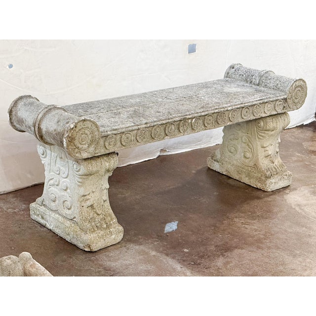 A handsome English garden long bench or window seat of composition stone in the Classical style, featuring a rectangular...