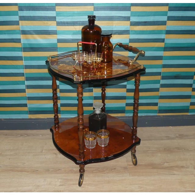 Elegant Bar or Tea Trolley Beautiful, high-quality craftsmanship Italian style Shelfs made of lacquered rosewood with...
