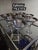 Eight vintage silver rimmed martini glasses.