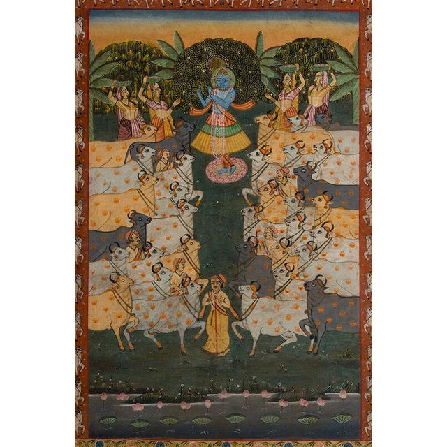 A monumental pair of late 20th century Indian Pichwai paintings depicting devotional scenes of Lord Krishna surrounded by...