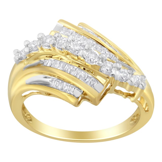 Make a unique style statement in front of your special guests by wearing this outstanding diamond ring. Fashioned in 10kt...