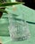 An elegant Arnica vase in clear glass, designed by the renowned Finnish designer Tapio Wirkkala for Iittala in 1975. The...