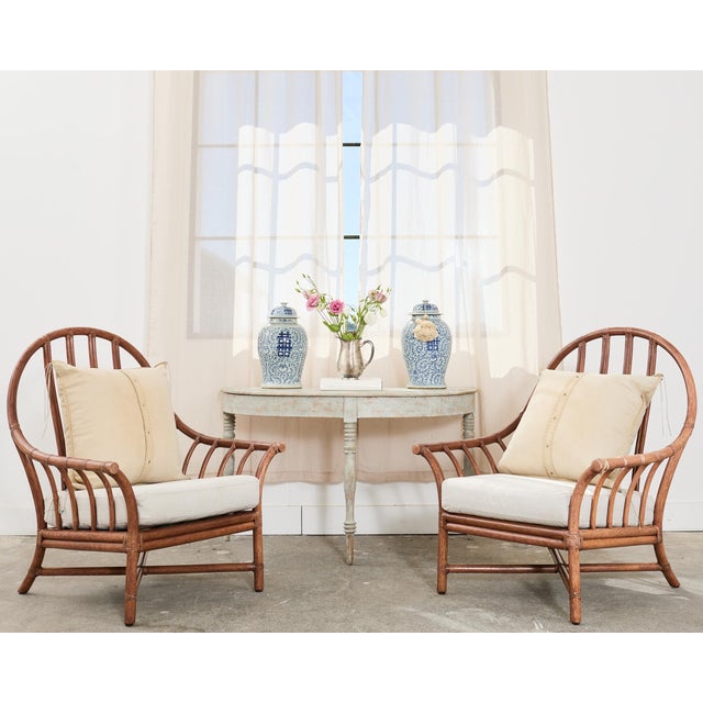 Large pair of painted Swedish demi-lune console tables or center table crafted in the Gustavian taste. The tables are...