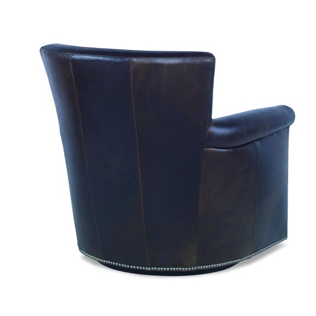 This piece is available only as shown, and will ship in 2-3 weeks. A swivel chair from Century Furniture's Century Trading...