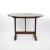 A provincial round vendange tilt top table with beautiful, richly-grained plank top and trestle supports, French circa...