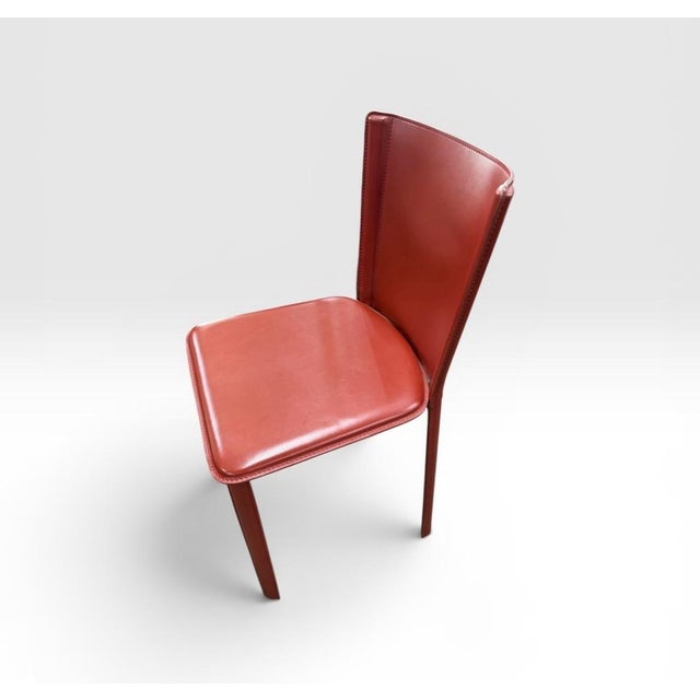 Bottega Chair (2003) is constructed with a harmonic sheet steel back that flexes with you for continuous support....