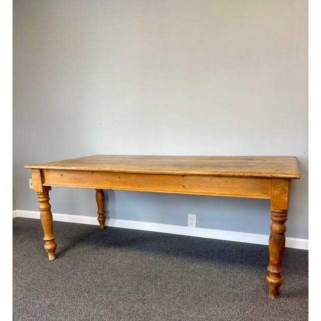 Some pieces earn their character over decades. Others earn it over centuries. This 19th century English pine table is one...